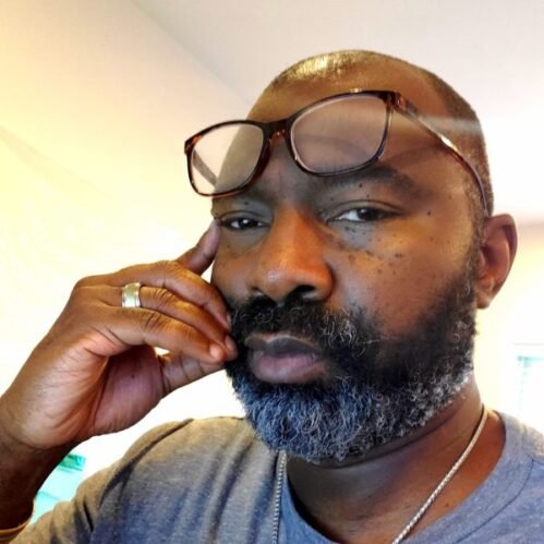 Marcel-Taylor-Headshot-scaled-600x600-c-default